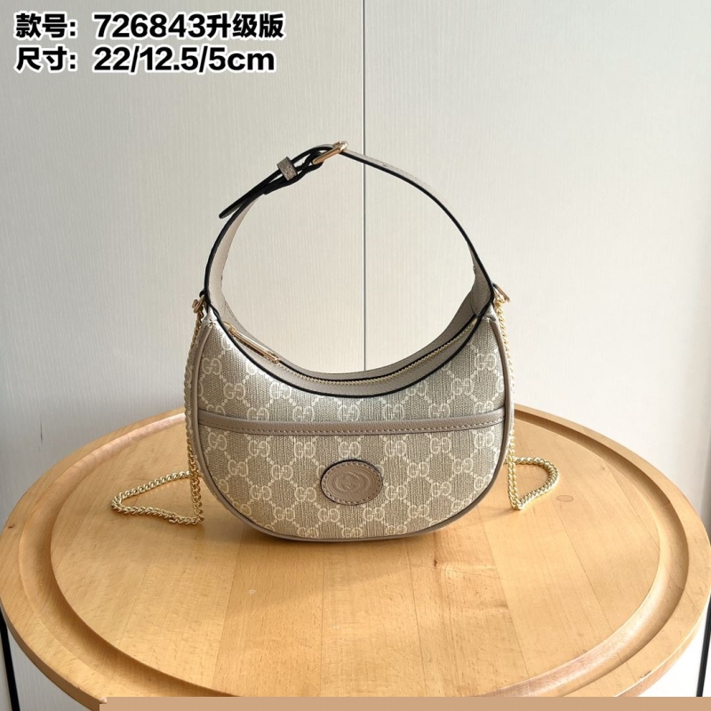 G*u*i top handle bags